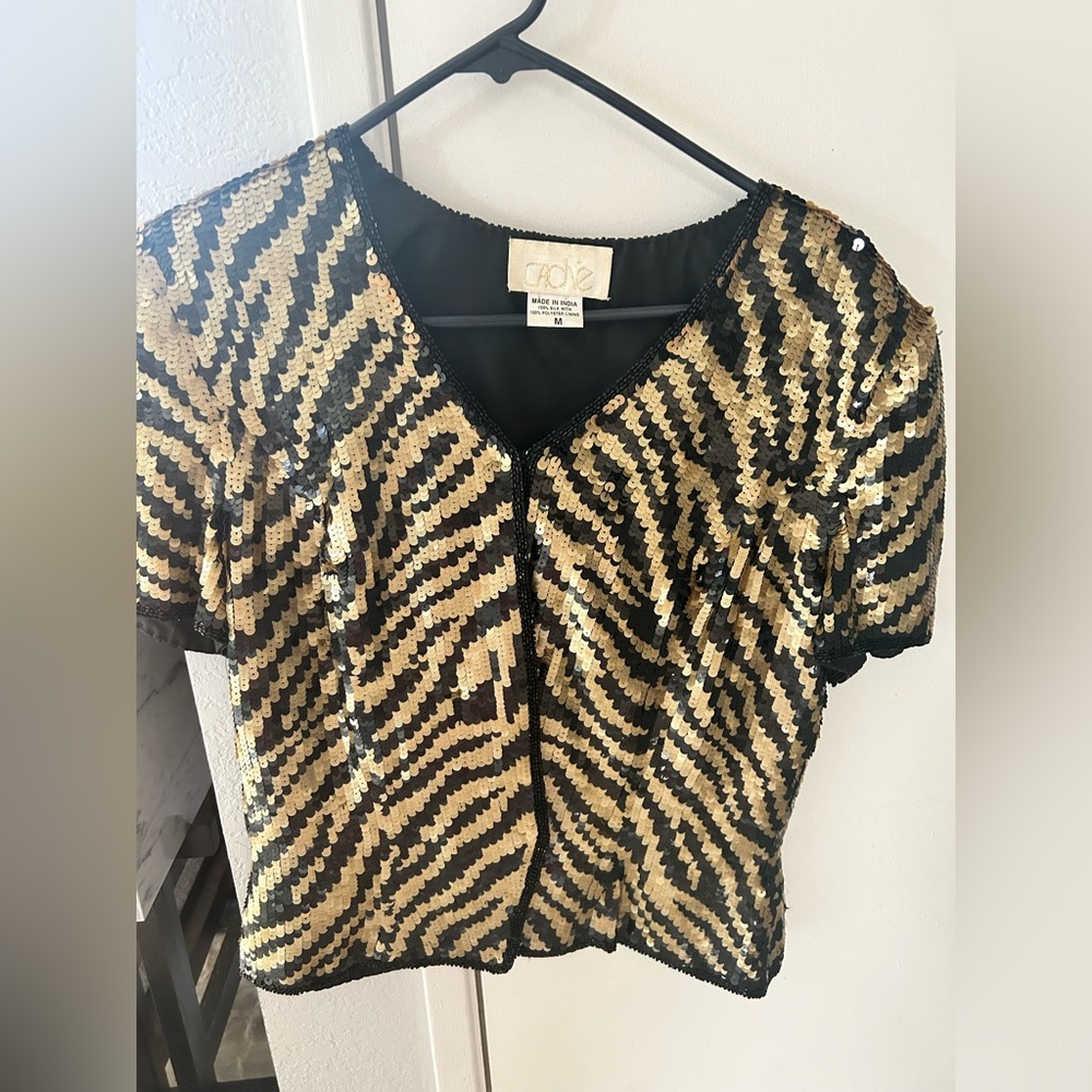 Evening sequined blouse